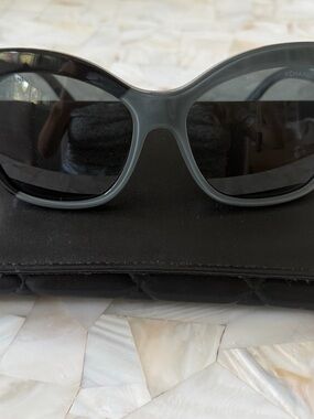 CHANEL Gray Oval Sunglasses with Dark Lenses